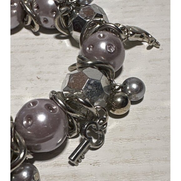 Vtg Charm Bracelet Silver Lavender Beaded Dolphin Starfish Key Accents Stretch - Picture 3 of 9